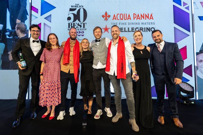 Chef Rasmus Kofoed, sommelier Sren Ledet and the team from Geranium, Copenhagen, receive the award for The Worlds Best Restaurant, sponsored by S.Pellegrino & Acqua Panna, at The Worlds 50 Best Restaurants awards 2022 held at Old Billingsgate in London