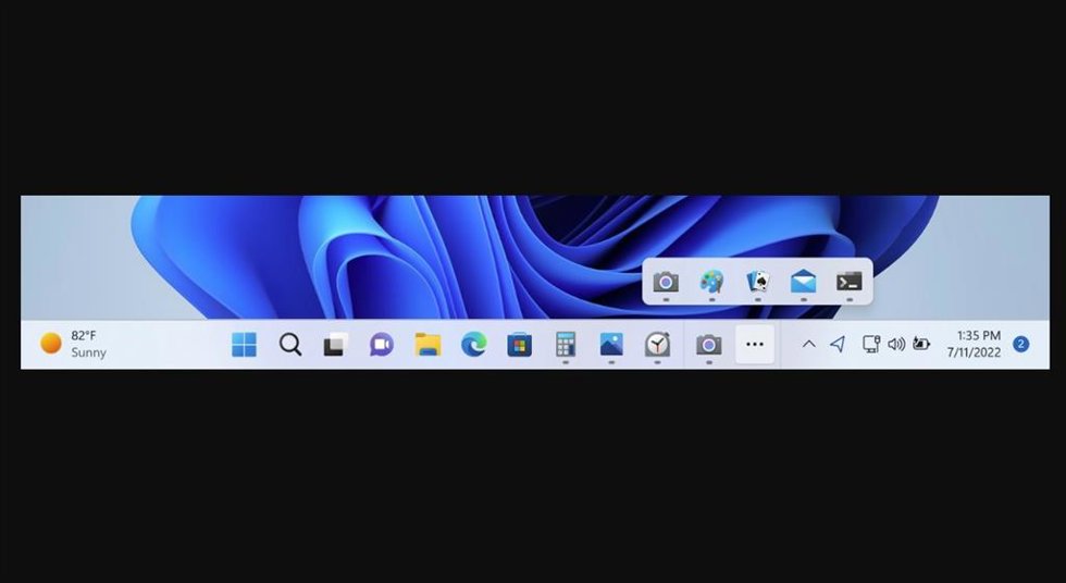 El menú de desbordamiento en la barra de tareas de Windows 11