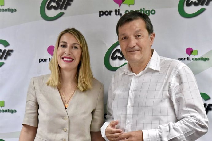 La presidenta del PP de Extremadura, María Guardiola, y el presidente de CSIF Extremadura, Benito Román