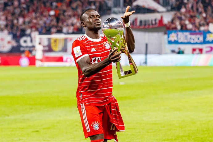 Sadio Mane of Bayern Munich celebrates with the trophy during the German Super Cup football match between RB Leipzig and Bayern Munich on July 30, 2022 at Red Bull Arena in Leipzig, Germany - Photo Max Ellerbrake / firo Sportphoto / DPPI