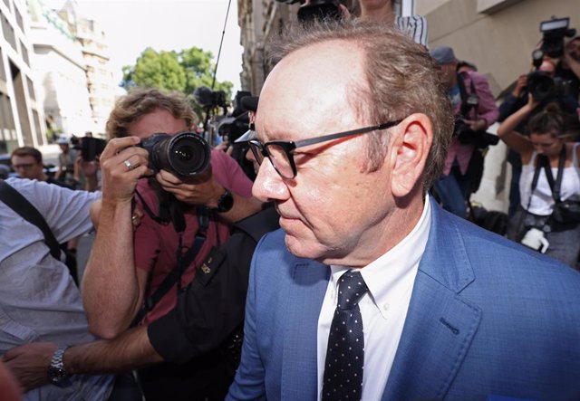American actor Kevin Spacey (R) leaves the Central Criminal Court (Old Bailey) in London after attending his trial.  