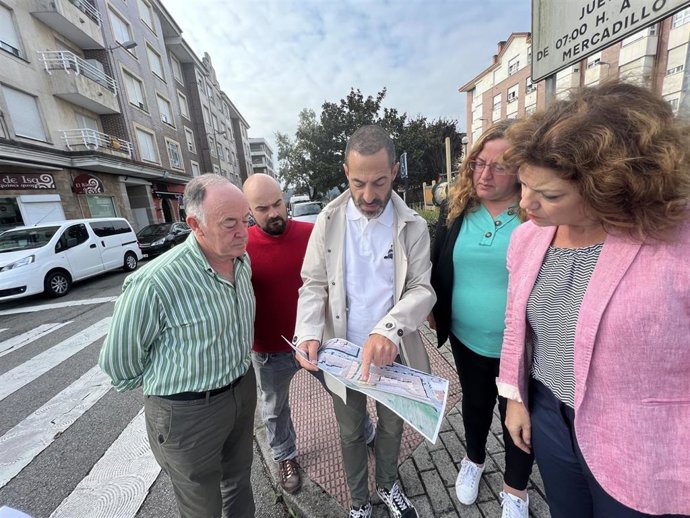 Angel García, en el centro