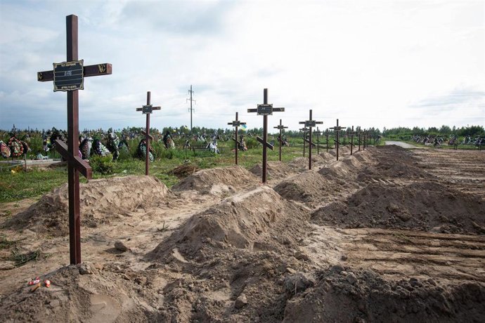 August 11, 2022, Bucha, Ukraine: Crosses with numbers on the graves of fifty unknown people killed by Russian troops during the occupation of town at the cemetery in Bucha. A small town of Bucha in Kyiv region was occupied by Russian troops for more tha