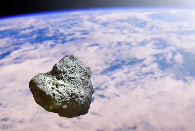 Asteroide acercándose a la Tierra