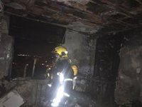 Rescatan a una mujer en el incendio de una vivienda en El Palo, en Málaga capital