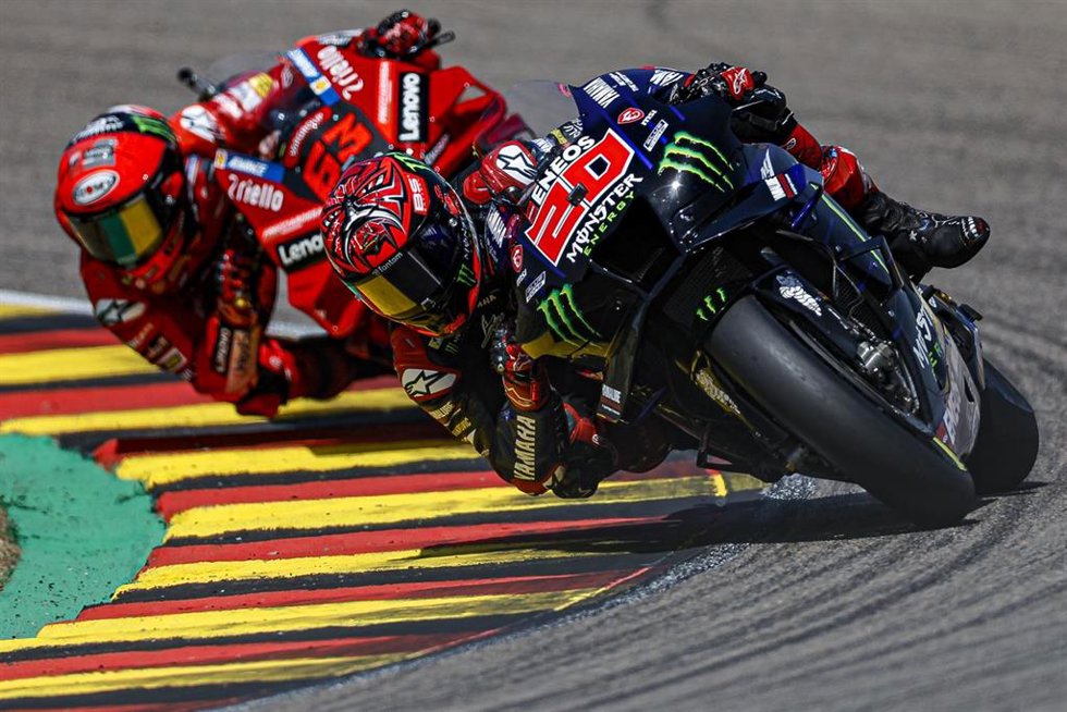 Archivo - Fabio Quartararo y Francesco Bagnaia durante el Gran Premio de Alemania 2022