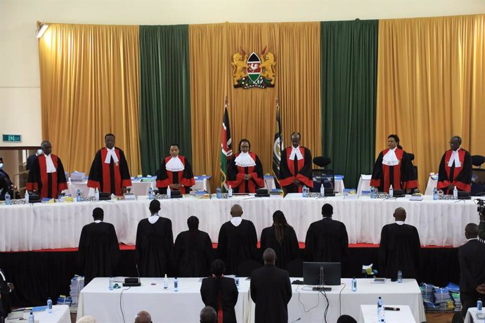 31 August 2022, Kenya, Nairobi: Chief justice of the supreme court Martha Koome (C) presides over a bench of seven judges which consists of (L-R) Supreme court judges, Isaac Lenaola, Smokin Wanjala, Philomena Mwilu, Mohamed Ibrahim, Njoki Ndungu, and Wi