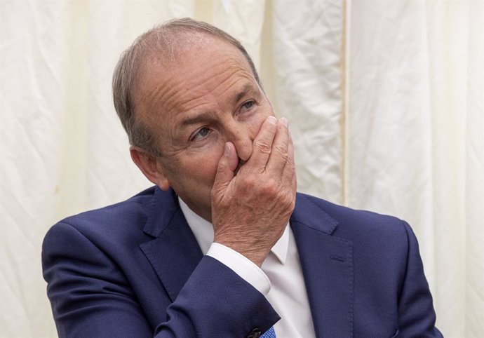 30 August 2022, Ireland, Clones: Taoiseach Micheal Martin reatcs during the laying of the foundation stone ceremony to mark the beginning of works on Phase 2 of the Ulster Canal restoration project. Photo: Liam Mcburney/PA Wire/dpa