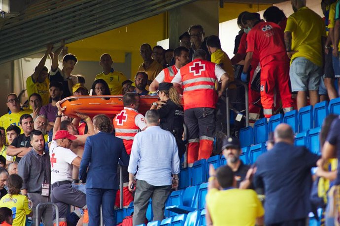 Medical staff are seen assisting a patient in the stands as the match is interrupted during the spanish league, La Liga Santander, football match played between Cadiz CF and FC Barcelona  at Nuevo Mirandilla stadium September 10, 2022, in Cadiz, Spain.
