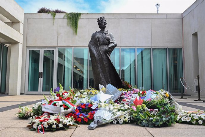 The wreaths are seen at the statue of Queen Elizabeth II at Parliament House in Canberra, Saturday, September 10, 2022. Australia continues to commemorate the seven-decade reign of Queen Elizabeth II following her death aged 96 in the early hours of Fri