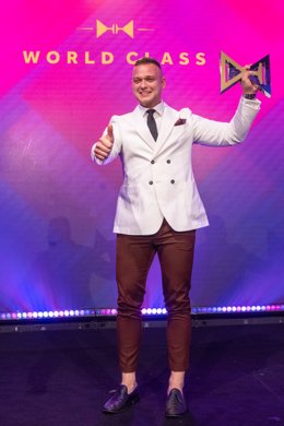 Adrián Michalcík, representing Norway, is awarded the title of worlds best bartender at the Diageo World Class Global Bartender of the Year 2022 competition in Sydney, Australia