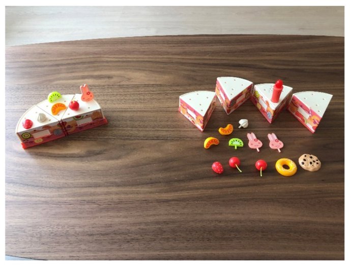 Juego de montaje de piezas basado en una tarta.