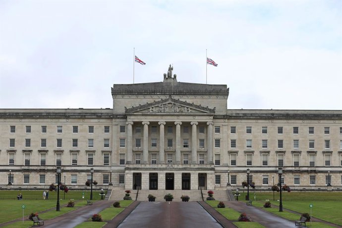 12 September 2022, United Kingdom, Belfast: The Union Flag flying at half mast at Parliament Buildings at Stormont following the death of Queen Elizabeth II. Photo: Liam Mcburney/PA Wire/dpa