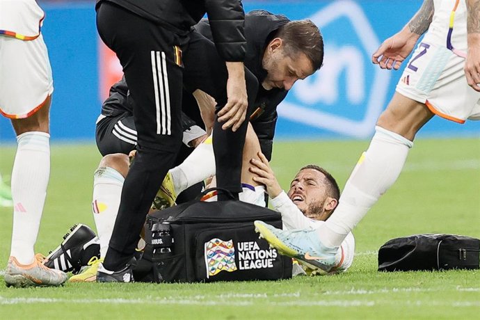 25 September 2022, Netherlands, Amsterdam: Belgium's Eden Hazard lies injured on the ground during the UEFA Nations League Group D soccer match between Netherlands and Belgium at Johan Cruijff Arena.
