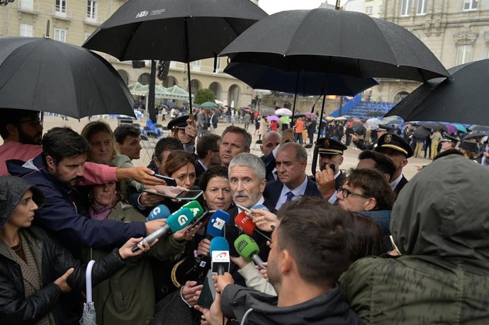 El ministro de Interior, Fernando Grande-Marlaska, ofrece declaraciones a los medios en el acto central del Día de la Policía Nacional