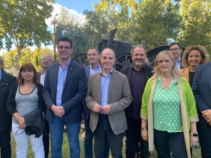 Jordi Turull en Lleida, junto al teniente de alcalde de Lleida, Toni Postius: el presidente del partido en Lleida, Eloi Bergós y la consellera Violant Cervera