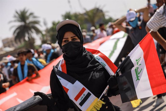 Archivo - Un amujer durante una protesta antigubernamental en la capital de Irak, Bagdad