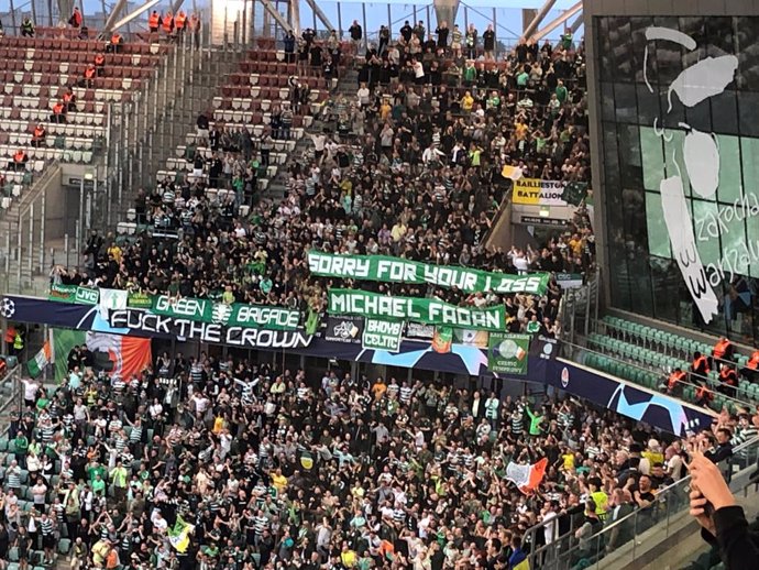 14 September 2022, Poland, Warsaw: A view of Celtic fans and banners in the stands during the UEFA Champions League Group F soccer match between Shakhtar Donetsk and Celtic at the Municipal Stadium of Legia Warsaw. Photo: Gavin Mccafferty/PA Wire/dpa