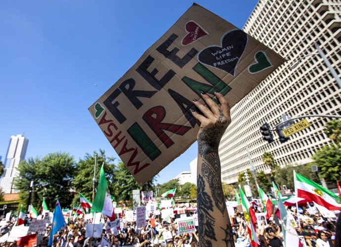 01 October 2022, US, Los Angeles: A protester holds a placard during a protest organized by Iranian-Americans for Justice and Human Rights outside City Hall in Downtown Los Angles for women's rights in Iran. Photo: Jill Connelly/ZUMA Press Wire/dpa