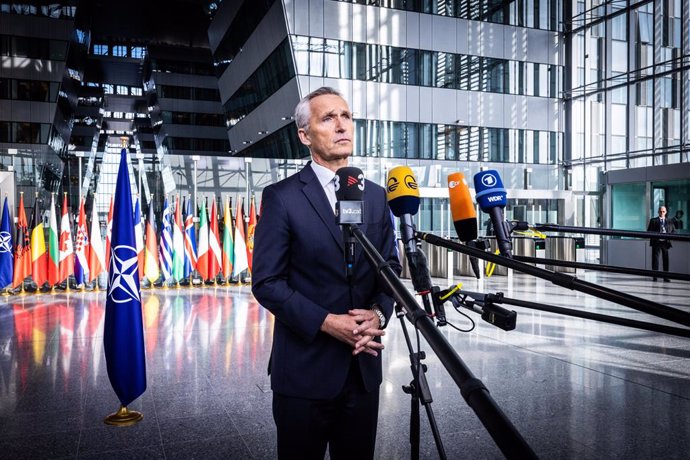 HANDOUT - 12 October 2022, Belgium, Brussels: NATO Secretary General Jens Stoltenberg speaks to media as he arrives for the NATO Defence Ministers meeting in Brussels. Photo: -/NATO/dpa - ATTENTION: editorial use only and only if the credit mentioned ab