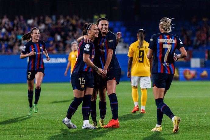 Lucy Bronze and Ingrid Engen of FC Barcelona celebrates a goal during the UEFA Women's Champions League group D match between FC Barcelona and SL Benfica  at Johan Cruyff Stadium on October 19, 2022 in Sant Joan Despi, Spain.