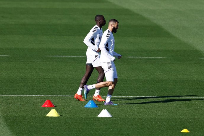 Ferland Mendy and Karim Benzema of Real Madrid in action during the training session before the spanish league, La Liga Santander, football match to play against FC Barcelona at Ciudad Deportiva Real Madrid on October 15, 2022, in Valdebebas, Madrid, Sp