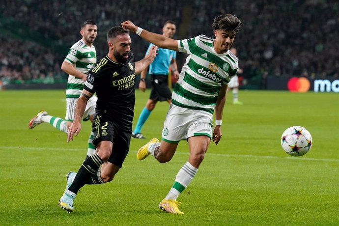 Archivo - 06 September 2022, United Kingdom, Glasgow: Real Madrid's Daniel Carvajal (L) and Celtic's Jaoa Pedro Neves Filipe battle for the ball during the UEFA Champions League Group F soccer match between Celtic vs Real Madrid at Celtic Park. Photo: A