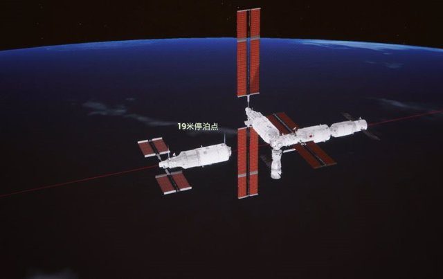 Esta imagen simulada capturada en el Centro de Control Aeroespacial de Pekín el 1 de noviembre de 2022 muestra el módulo de laboratorio de Mengtian reuniéndose y acoplándose con el puerto frontal del módulo central de Tianhe.