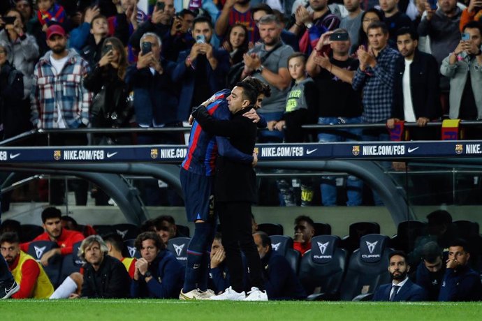 Gerard Pique y Xavi Hernandez 