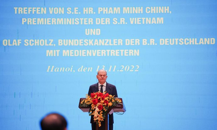13 November 2022, Vietnam, Hanoi: German Chancellor Olaf Scholz speaks during a press conference with Vietnamese Prime Minister Pham Minh Chinh after their meeting. Photo: Kay Nietfeld/dpa