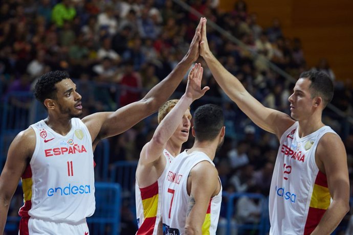 Sebas Saiz and Mikel Salvo of Spain gestures during the FIBA World Cup qualifiers basketball match played between Spain and Netherlands at Carolina Marin Pavilion on November 14, 2022 in Huelva, Spain.