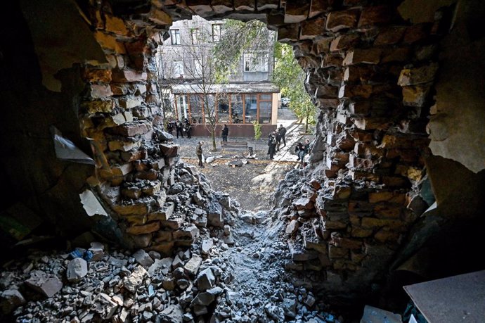 FILED - 21 October 2022, Ukraine, Zaporizhzhia: A view of hole in the wall of a residential building damaged as a result of a rocket attack by the russian troops. Photo: -/Ukrinform/dpa