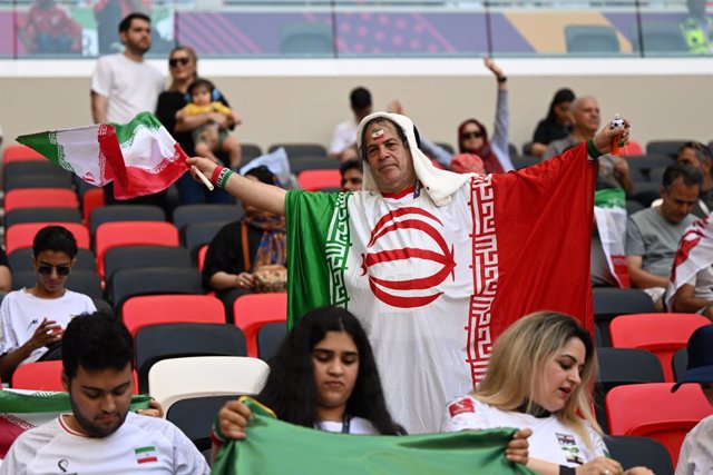 25 November 2022, Qatar, Al Rayyan: An Iranian fan shows his support from the stands ahead of the FIFA World Cup Qatar 2022 Group B soccer match between Wales and Iran at Ahmad bin Ali Stadium. Photo: Federico Gambarini/dpa