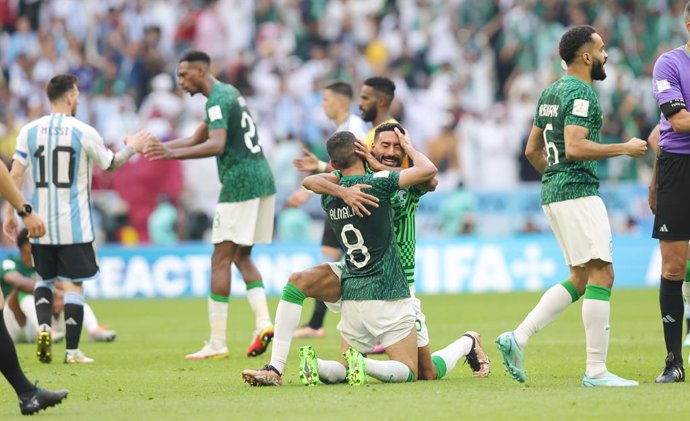 Abdulellah Al Malki and Ali Al Hassan of Saudi Arabia celebrate at full time during the FIFA World Cup 2022, Group C football match between Argentina and Saudi Arabia on November 22, 2022 at Lusail Stadium in Al Daayen, Qatar - Photo Sebastian El-Saqqa 