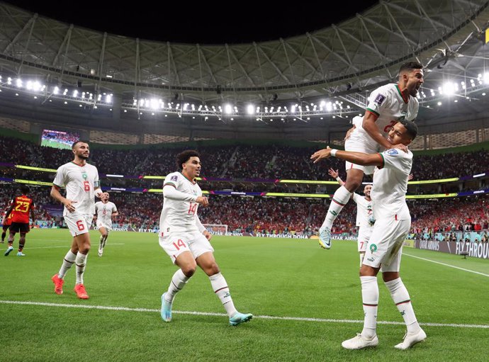 27 November 2022, Qatar, Doha: Morocco's Abdelhamid Sabiri celebrates with his teammates after scoring his side's first goal during the FIFA World Cup Qatar 2022 Group F soccer match between Belgium and Morocco at Al Thumama Stadium. Photo: Bruno Fahy/B