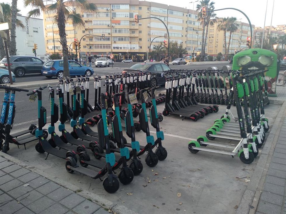 Archivo - Aparcamiento de patinetes en Málaga capital