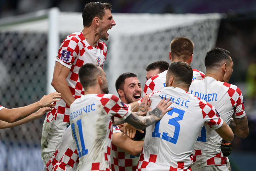 05 December 2022, Qatar, Al-Wakra: Croatia players celebrate victory after the FIFA World Cup Qatar 2022 Round of 16 soccer match between Japan and Croatia at Al Janoub Stadium. Photo: Robert Michael/dpa