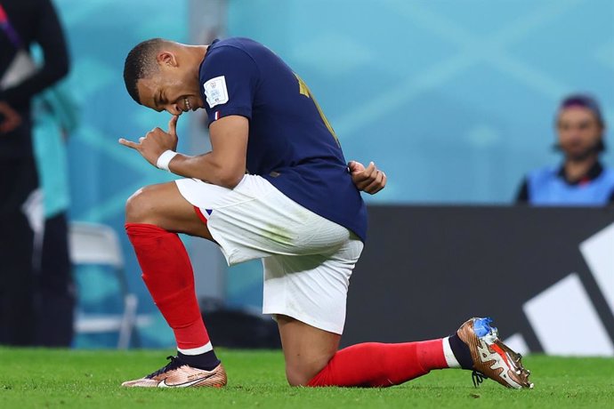 04 December 2022, Qatar, Doha: France's Kylian Mbappe celebrates scoring his side's second goal during the FIFA World Cup Qatar 2022 round of 16 soccer match between France and Poland at Al-Thumama stadium. Photo: Tom Weller/dpa