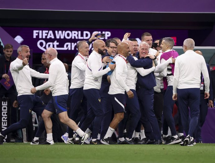 Coach of France Didier Deschamps and his staff celebrate the victory following the FIFA World Cup 2022, Quarter-final football match between England and France on December 10, 2022 at Al Bayt Stadium in Al Khor, Qatar - Photo Jean Catuffe / DPPI