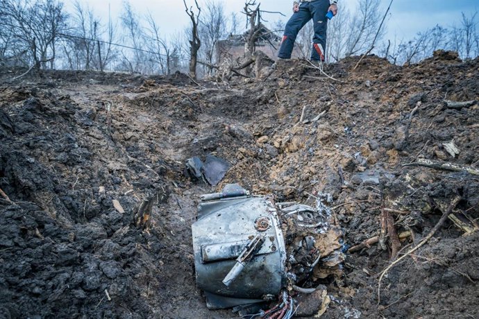 December 10, 2022, Kostiantynivka, Donetsk, Ukraine: Rocket engine remains after a russian shelling over  Kostiantynivka, a village in Donetsk region. Explosion made a huge devastation ripping off all trees around and provoked damages in the civilian bu