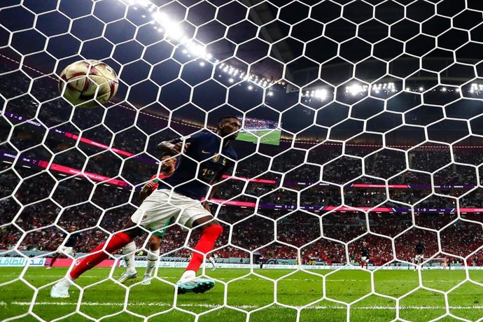 14 December 2022, Qatar, Al Khor: France's Randal Kolo Muani scores his side's second goal during the FIFA World Cup Qatar 2022 Semi-Final soccer match between France and Morocco at the Al Bayt Stadium. Photo: Tom Weller/dpa