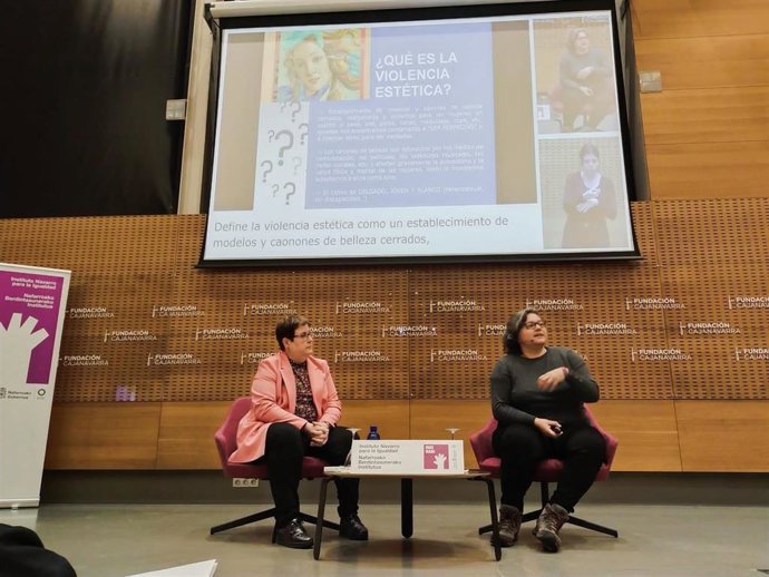 Lerga y Piñeyro, durante el coloquio.