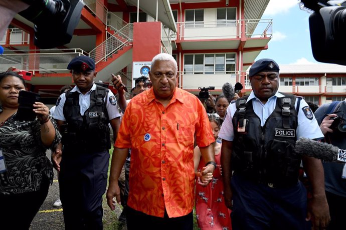 Fijis Prime Minister and FijiFirst leader Frank Bainimarama leaves after voting at the Yat Sen Secondary School polling station during the Fijian election campaign in Suva, Fiji, Wednesday, December 14, 2022. A total of 342 candidates from nine politic