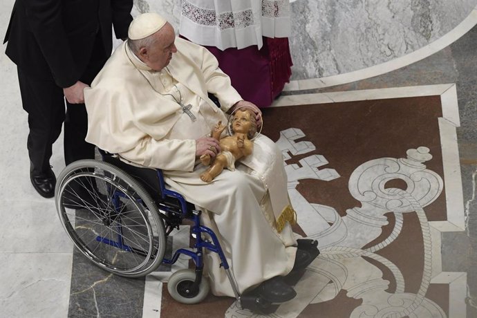 December 24, 2022, Vatican City, Vatican City: A handout picture, provided by Vatican Media Press Office, shows Pope Francis while presiding at Christmas Night Mass in St Peters Basilica, Vatican City, 24 December 2022.There are seven thousand faithful