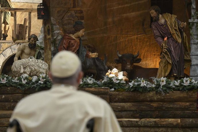 December 24, 2022, Vatican City, Vatican City: A handout picture, provided by Vatican Media Press Office, shows Pope Francis while presiding at Christmas Night Mass in St Peters Basilica, Vatican City, 24 December 2022.There are seven thousand faithful