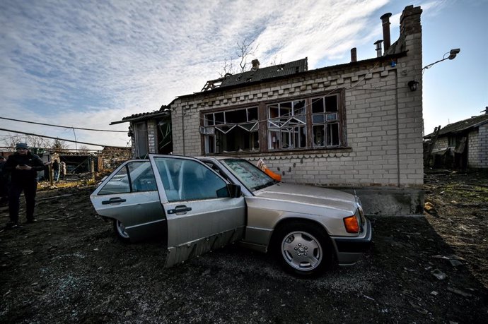 29 December 2022, Ukraine, Stepne: A car is parked outside a house destroyed in a Russian S-300 missile attack on Stepne village. Photo: -/Ukrinform/dpa