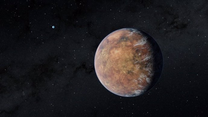 En esta ilustración, el planeta TOI 700 e, del tamaño de la Tierra, recientemente descubierto, orbita en la zona habitable de su estrella. Su hermano del tamaño de la Tierra, TOI 700 d, puede verse en la distancia.