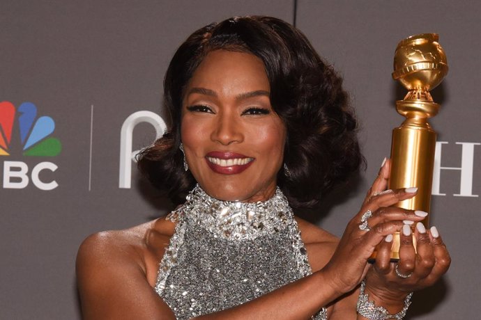 Angela Bassett poses with the award for Best Supporting Actress - Motion Picture for "Black Panther: Wakanda Forever" in the press room during the 80th annual Golden Globe Awards at The Beverly Hilton hotel