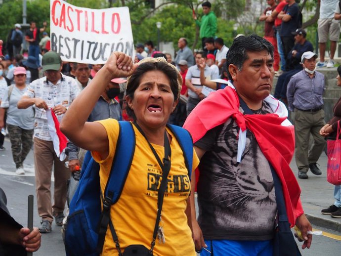 January 4, 2023, Lima, Peru: A woman with her fist raised marches with hundreds protesting against president Dina Boluarte and the Congress, asking for president resignation, new elections and a new constitution. Boluarte assumed the presidency on Decem