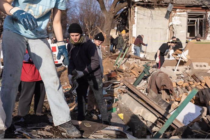 January 3, 2023, Kyiv, Ukraine: Volunteers clear and dismantle debris at the site of a Russian missile attack on December 31. On Saturday, December 31, the Russian Armed Forces massively attacked Ukrainian cities with cruise missiles. As a result of the